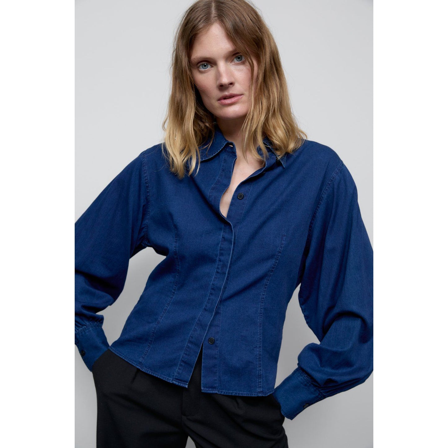 Dark blue tailored cotton blouse for women by Closed Women's, shown on a model, featuring a classic fit and button-down front.