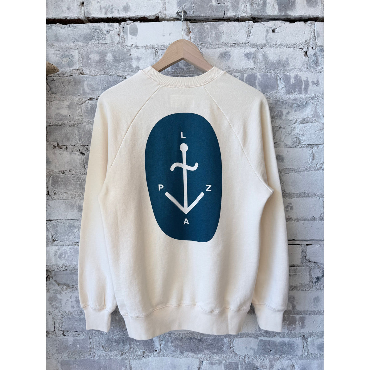Men's La Paz Cunha La Paz Crew in ecru, featuring a soft knit fabric and classic crew neck design.