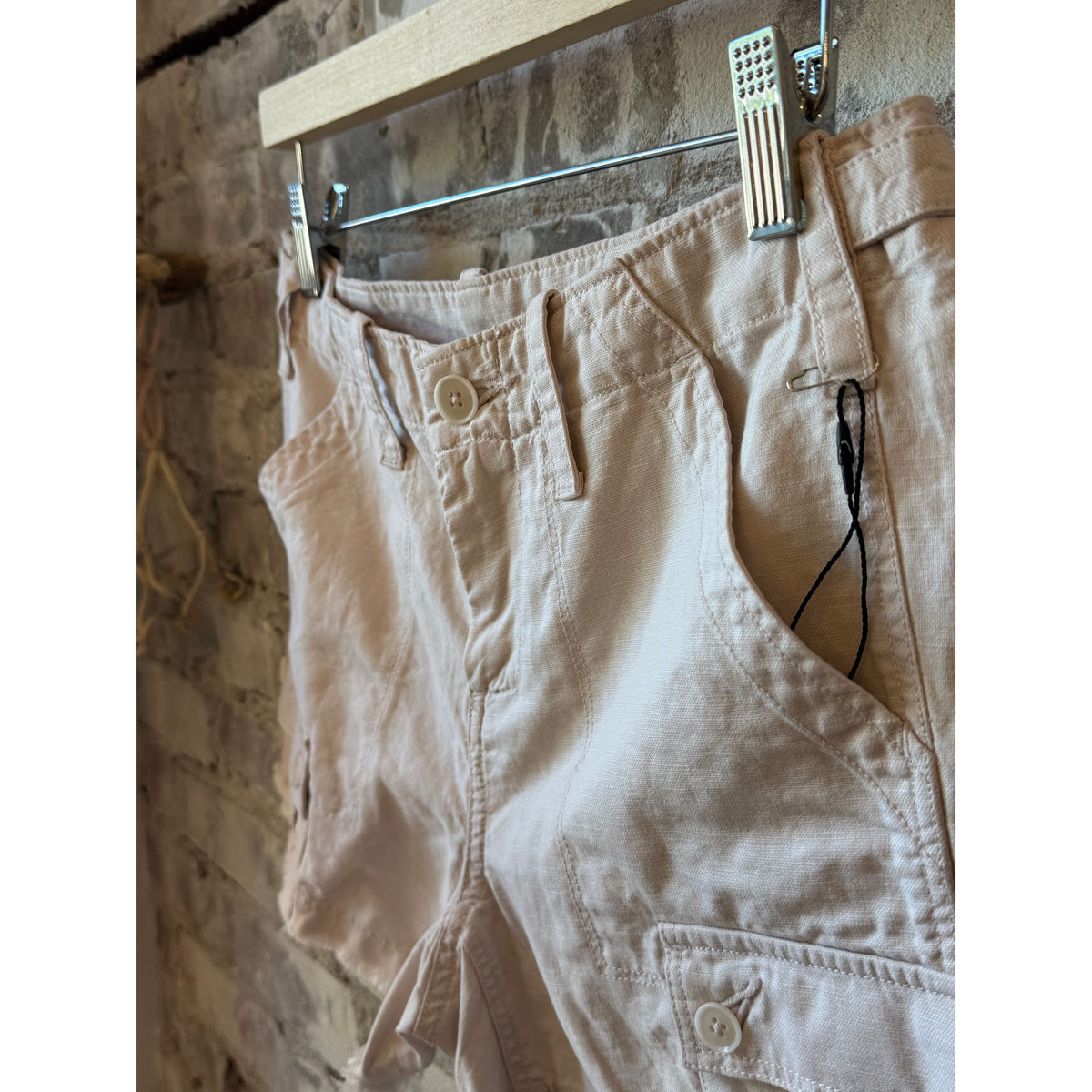 Women's pale pink drill shorts by G1 Women's, featuring a casual fit and comfortable fabric, shown on a model.