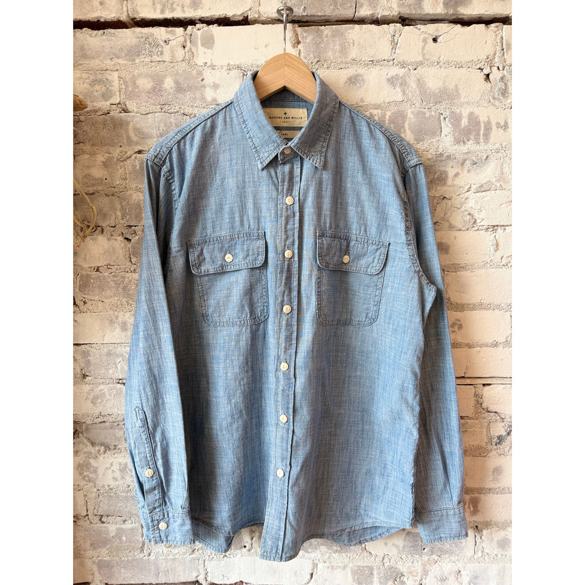 Men's Earl Chambray 2-Pocket Workshirt by imogene + willie in chambray blue, featuring button-up front and two chest pockets.