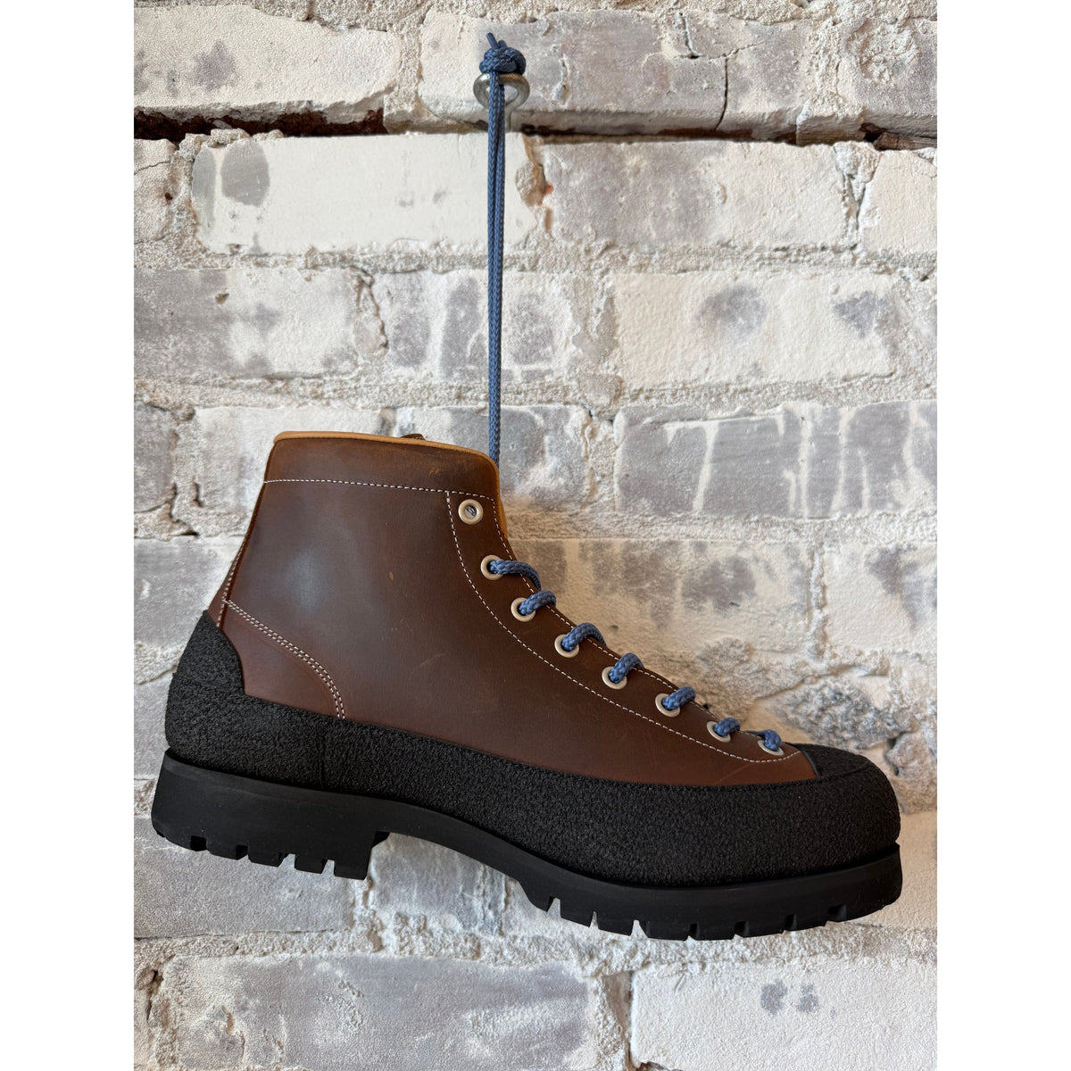 Men's El Cap Leather Boot by Big Rock Candy Mountaineering in Nutmeg, showcasing rugged leather design and sturdy sole.