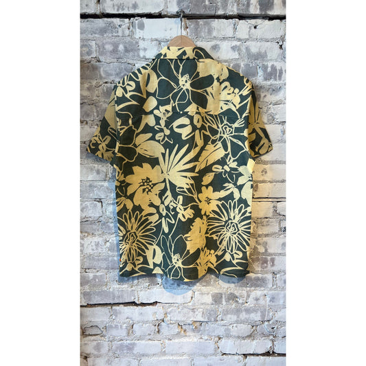 Men's Selleck shirt by Far Afield in charcoal grey with a foliage print, featuring a classic collar and button-front design.