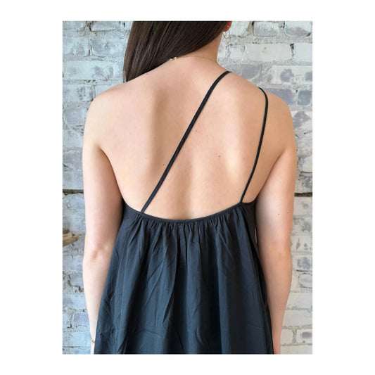 Black gathered asymmetrical women's dress by Closed Women's, featuring a stylish, flowing design with unique asymmetrical details.