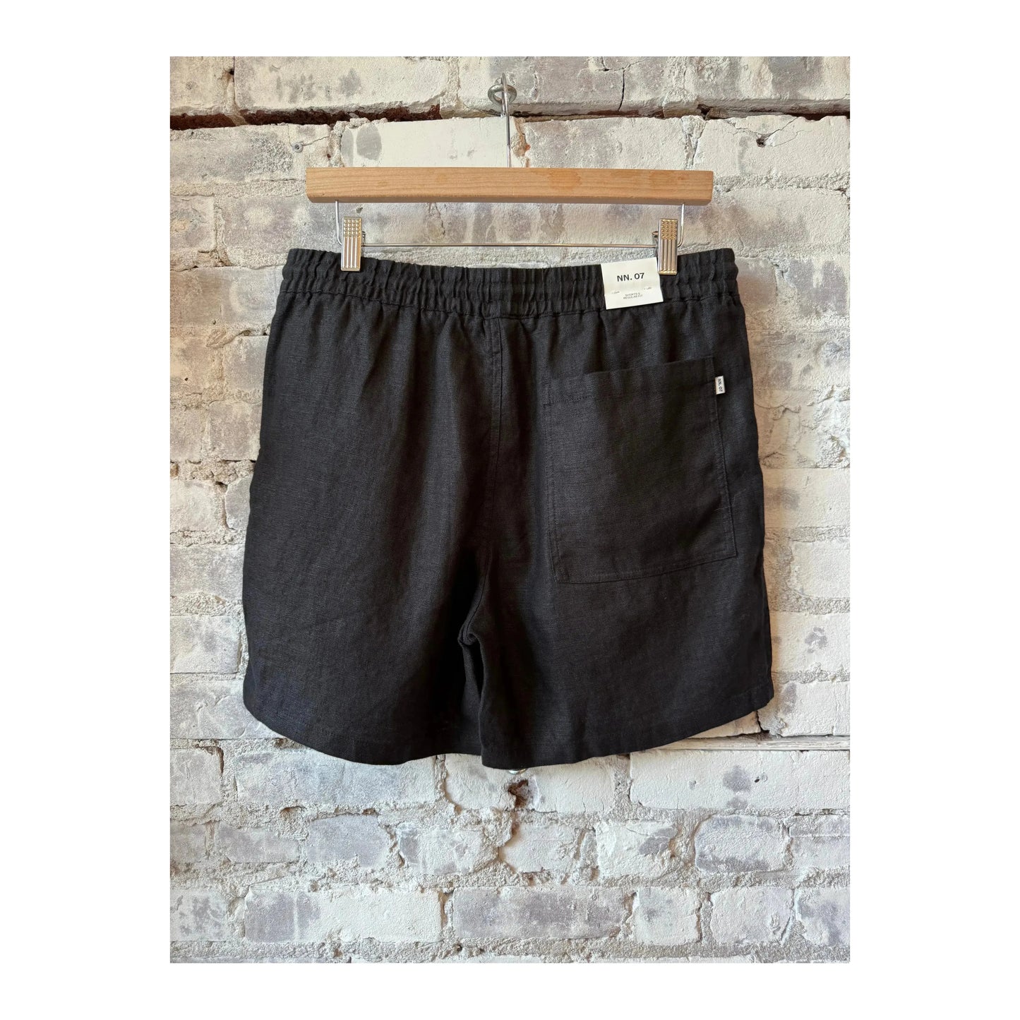 Men's black linen shorts with drawstring waist from NN07, casual Gregor style, shown with relaxed fit and lightweight fabric.