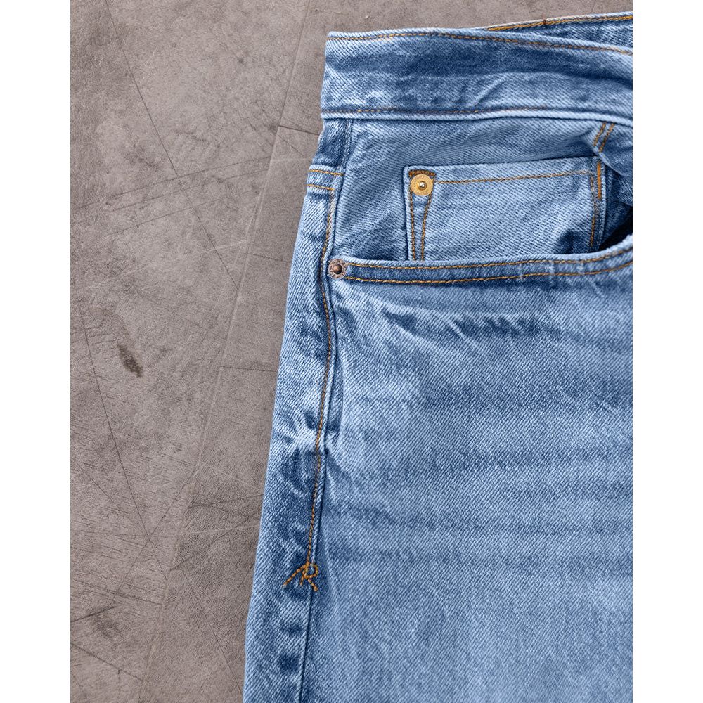 Men's Ace Rivington Harlan Straight Archive Selvedge 12oz jeans in Decade Wash, showing the front view and detailed stitching.