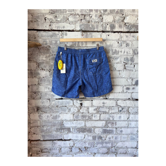 Men's Hartford nylon swim trunks with blue palms print, featuring an elastic waistband and side pockets.