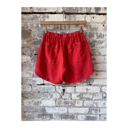 Hartford Women's Soko Linen Short in Poppy color, lightweight and breathable for warm weather, shown on a model.