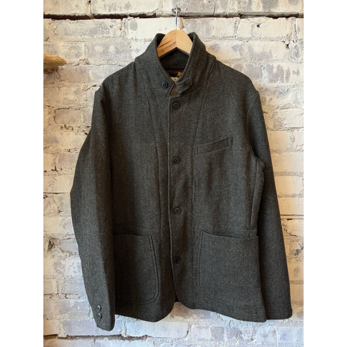 Men's Heritage Trap Blazer by Relwen in charcoal olive herringbone fabric, tailored fit, with classic lapel and button closure.