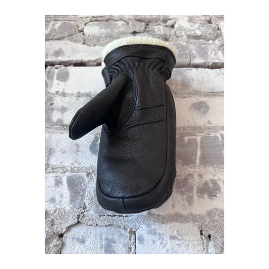 Women's Hestra Boda Mitt in black, showcasing the insulated winter glove with a sleek, durable design and cozy lining.