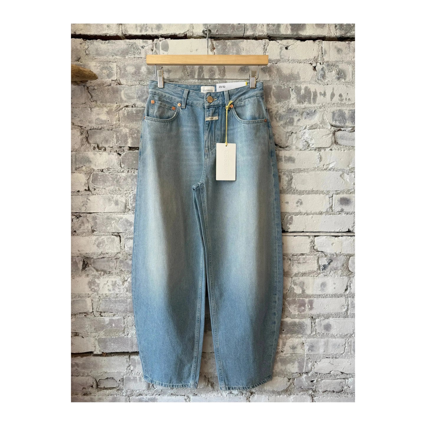 Light blue women's Jazzie Barrel Jeans by Closed Women's displayed on a model, showcasing relaxed fit and stylish denim.