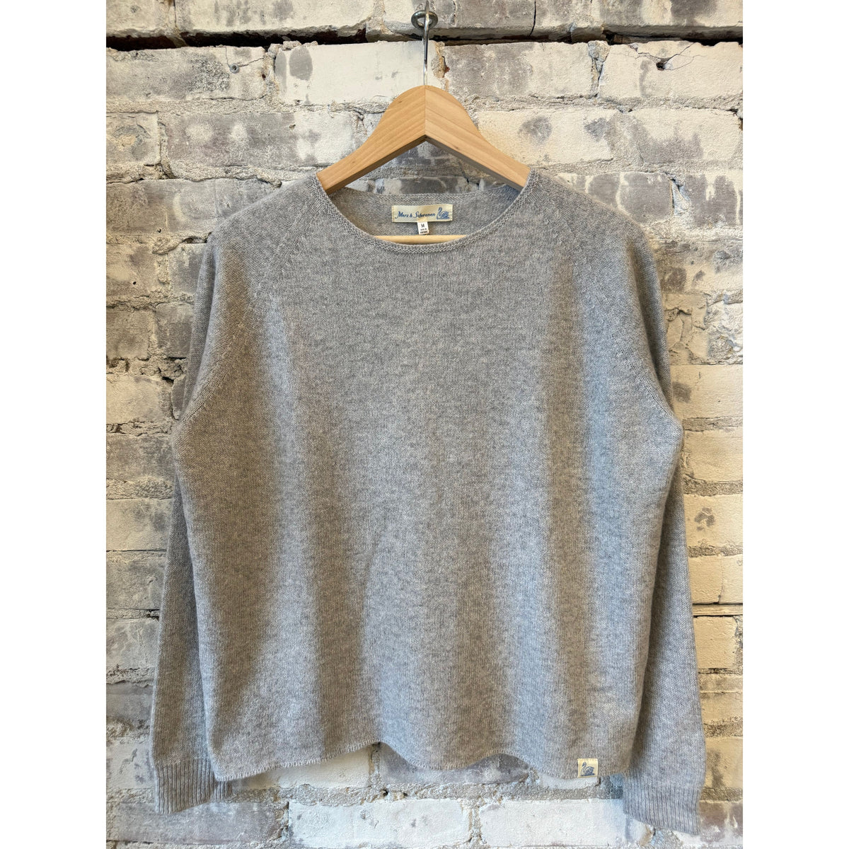 Women's lightweight Merino wool, cashmere, and silk crew neck sweater in grey melange by Merz b. Schwanen.