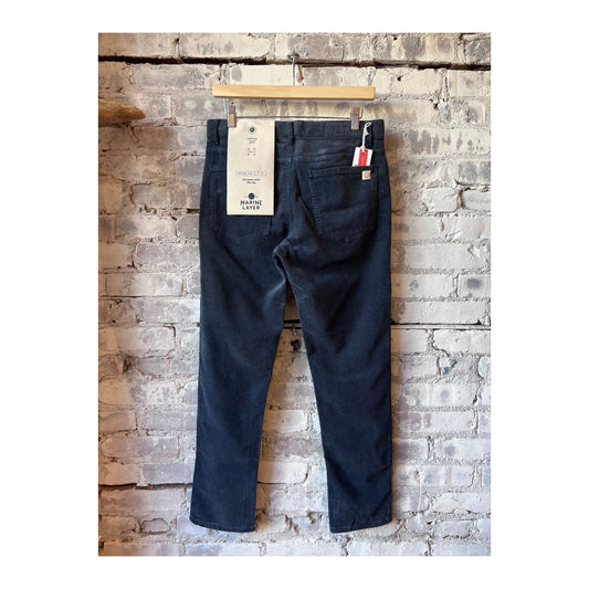 Men's Marine Layer Terry Cord Slim Straight 5 Pocket Pant in Midnight Navy, showing the fit and fabric texture.