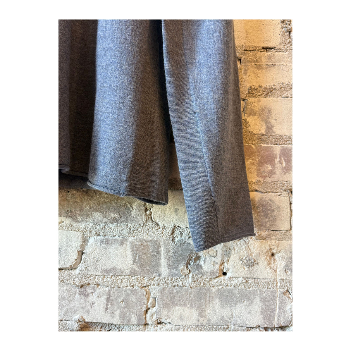 Men's Amundsen boiled denim blue half-zip sweater, showcasing the textured fabric and half-zip collar on a neutral background.