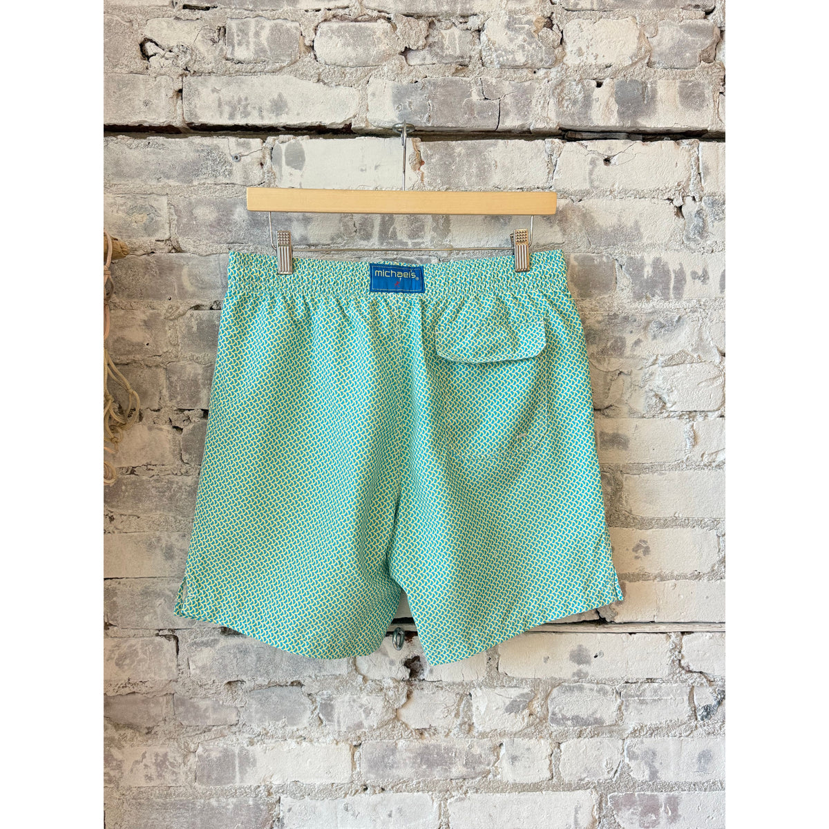 Men's cyclist liner swim trunks with wave print in aqua and yellow from Michael's Swim, featuring a comfortable fit and vibrant design.