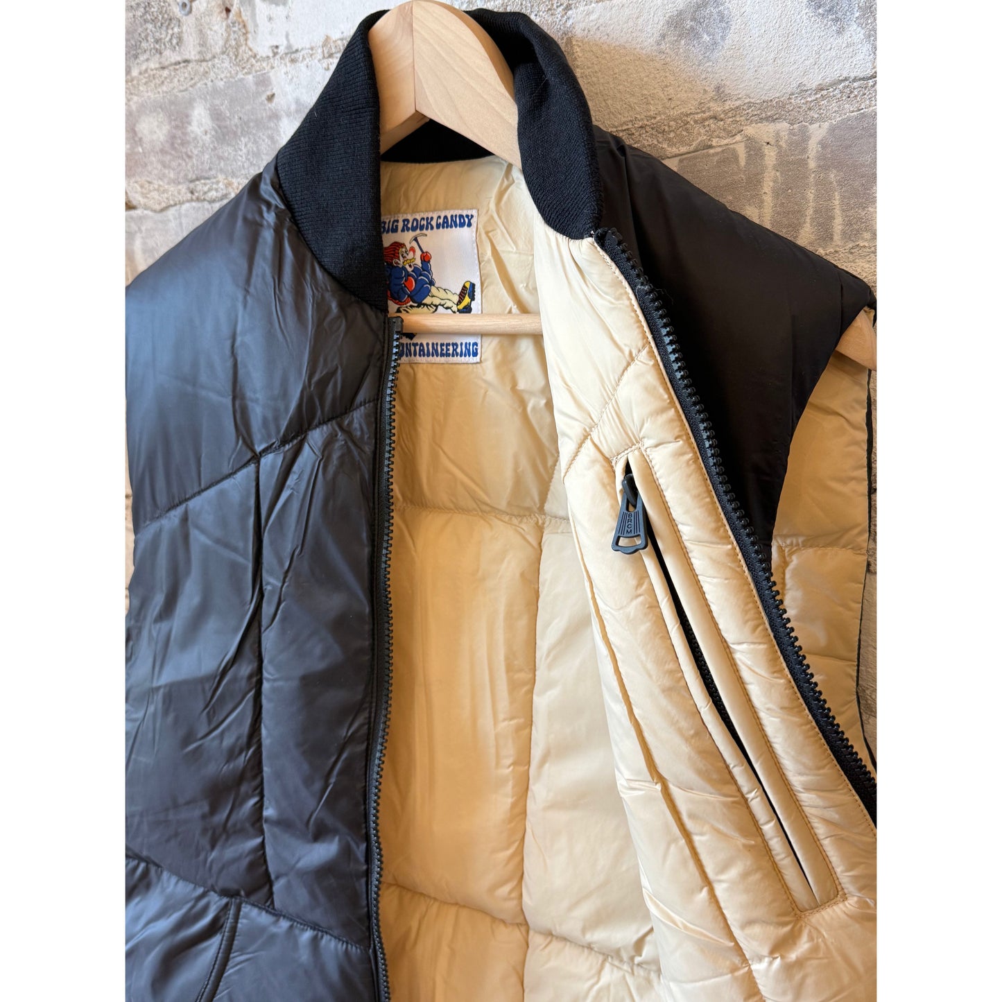 Men's Minarets Vest by Big Rock Candy Mountaineering in black licorice, featuring a sleek, insulated outdoor vest with a high collar.