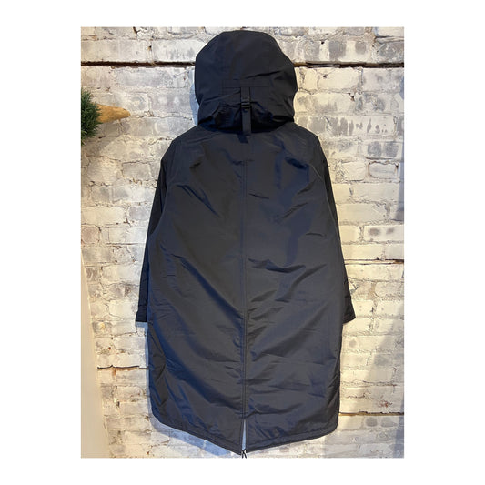 Men's navy GORE-TEX long down coat by nanamica, featuring a insulated, waterproof winter outerwear design.