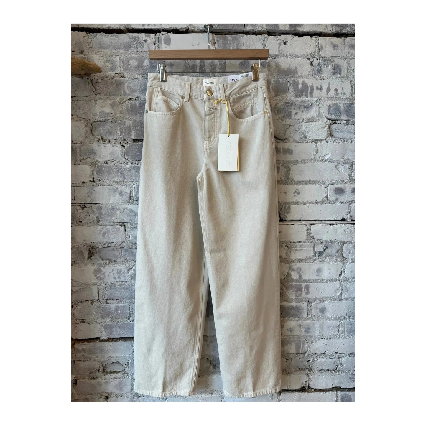 Close-up of Closed Women's Nikka Wide Jean in Stone Beige, showing the relaxed fit, denim texture, and subtle stitching details.