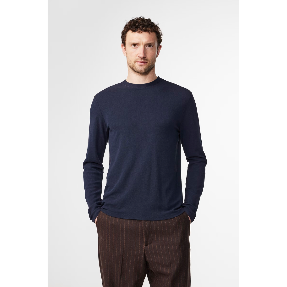Men's navy blue waffle knit tee by NN07, featuring a textured fabric design and classic fit.