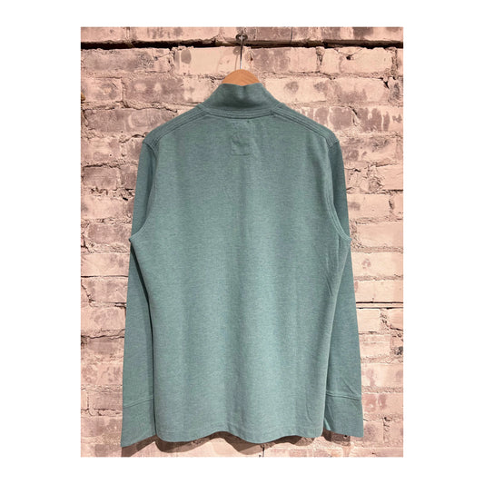 Men's Relwen Pique Button Mock in Ocean Heather, showcasing a close-up of the textured polo shirt with buttons on a plain background.