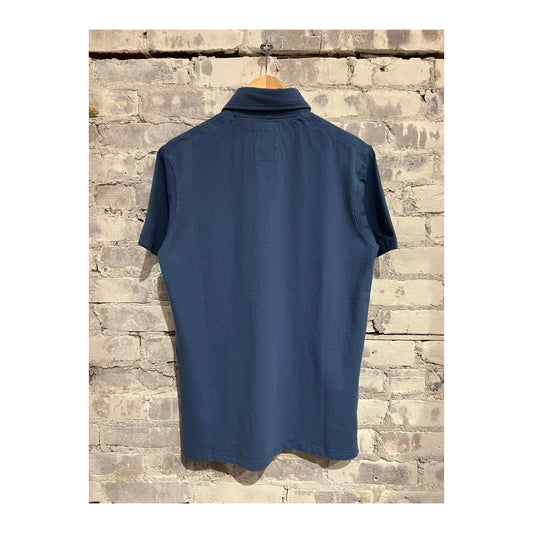 Men's Marine Blue Pique Slot Polo shirt by Relwen, featuring a classic collar and short sleeves, displayed on a hanger.