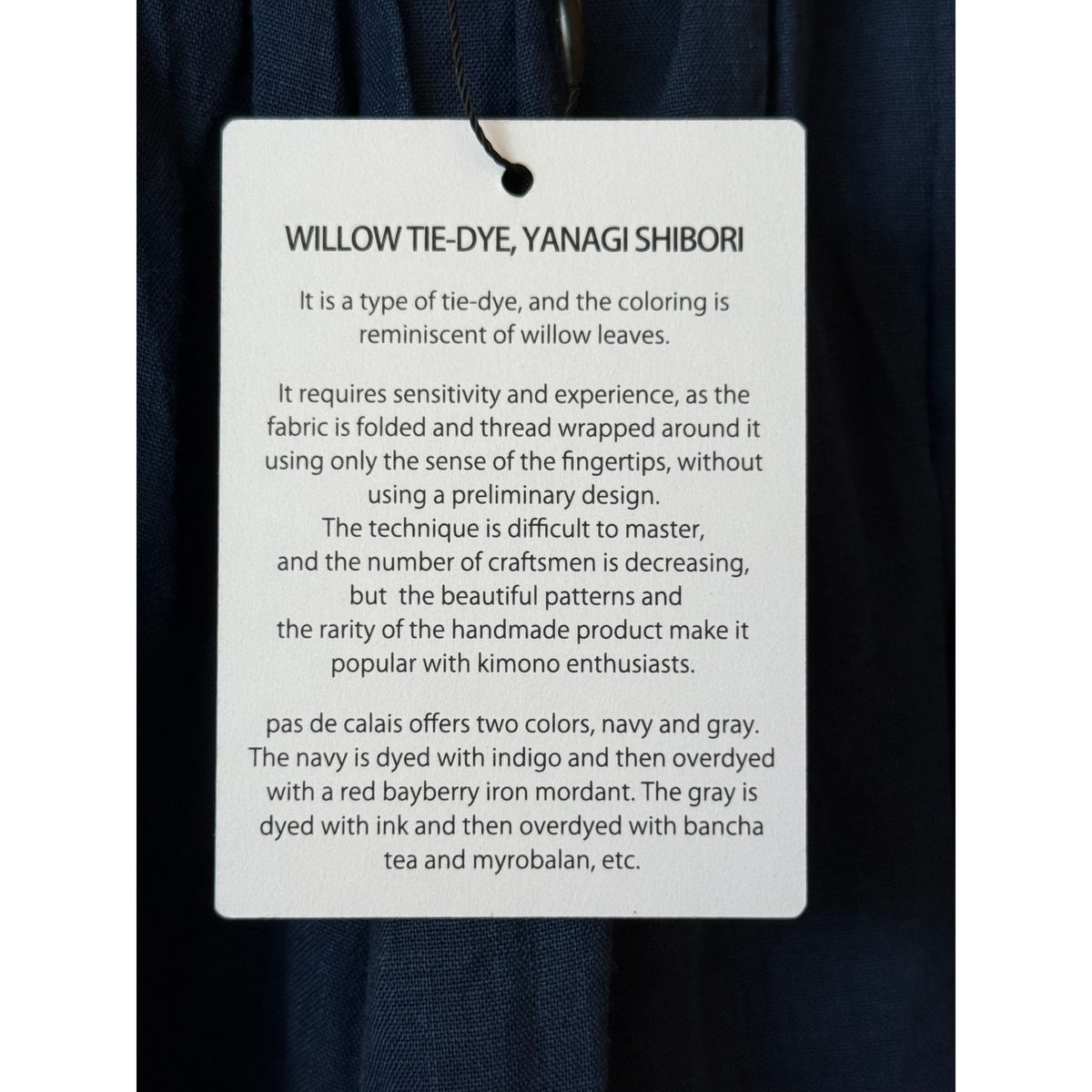 Women's Ramie Tencel Willow Dye skirt with cupro underskirt in indigo and beige by Pas de Calais, shown with flowing fabric details.