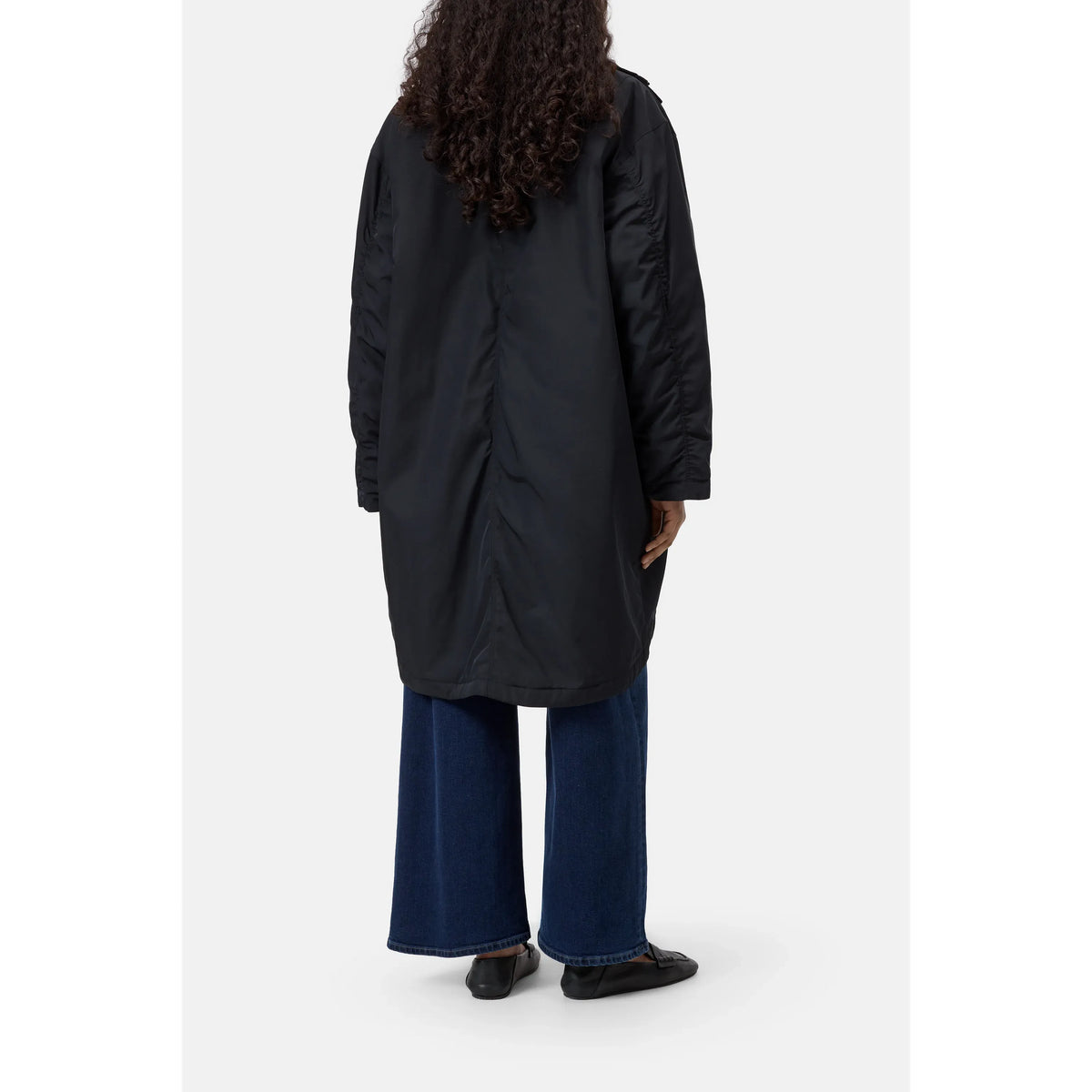 Women's black relaxed parka jacket by Closed Women's, showing a comfortable, casual fit with hood and front pockets.