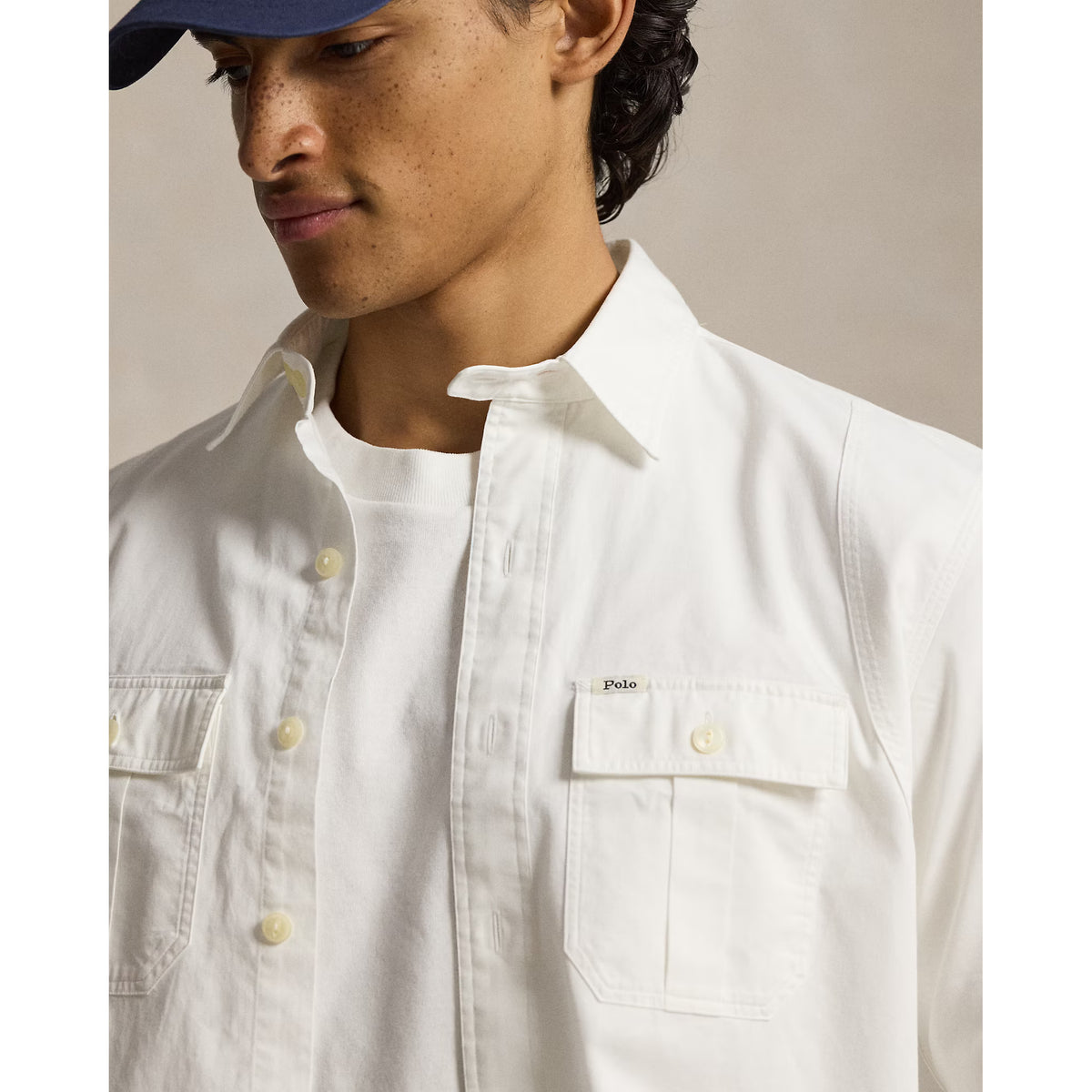 Men's white Classic Fit Sateen Workshirt by Polo RL, showing the tailored design and soft, smooth fabric.