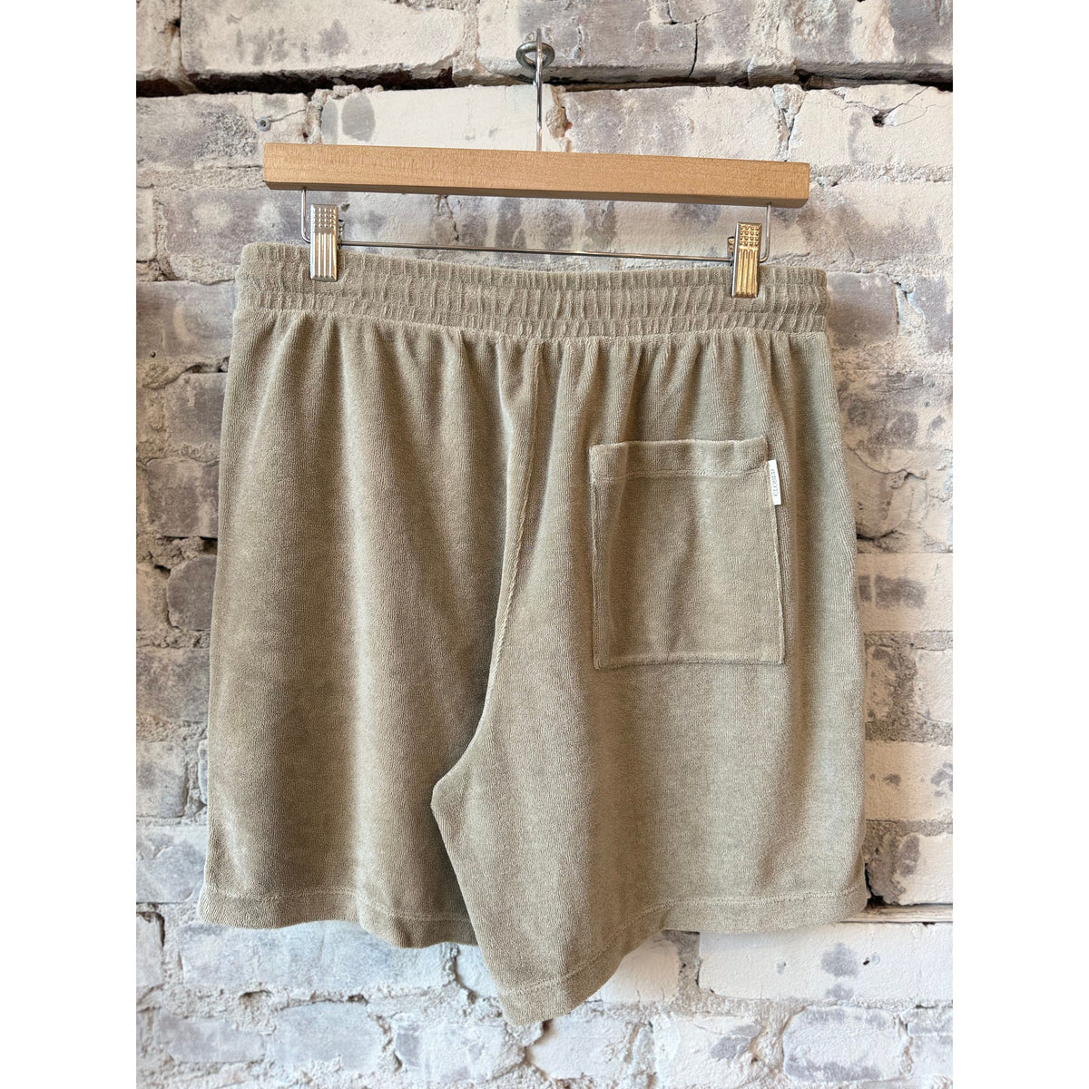 Men's terry cloth shorts in mud grey by Closed Men's, showing a relaxed fit and soft fabric texture.