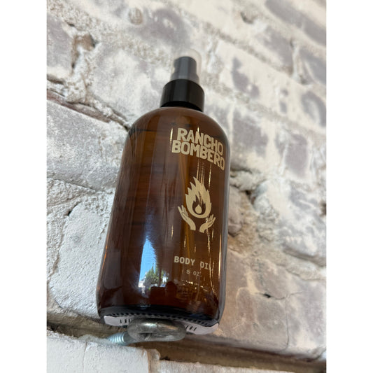 Rancho Bombero Total Body Oil 8 oz bottle, natural skincare accessory with soothing, nourishing oil for skin care routines