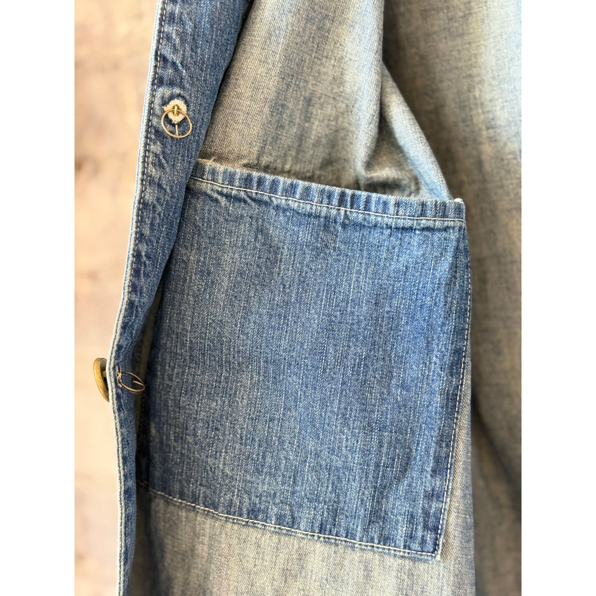 Unisex 11oz selvedge denim chore jacket by Chimala, featuring rugged fabric, classic collar, button closure, and versatile style.