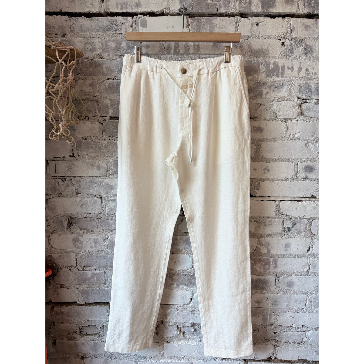 Men's Vigo tapered linen pants by Closed Men's in ivory, featuring a relaxed fit and tapered leg style.