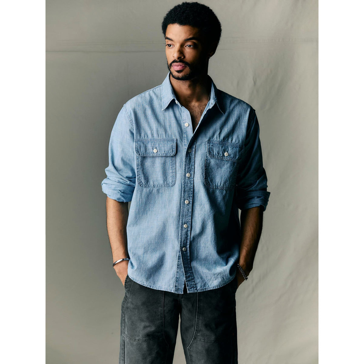 Men's Earl Chambray 2-Pocket Workshirt in chambray blue by imogene + willie, shown with front view and button details.