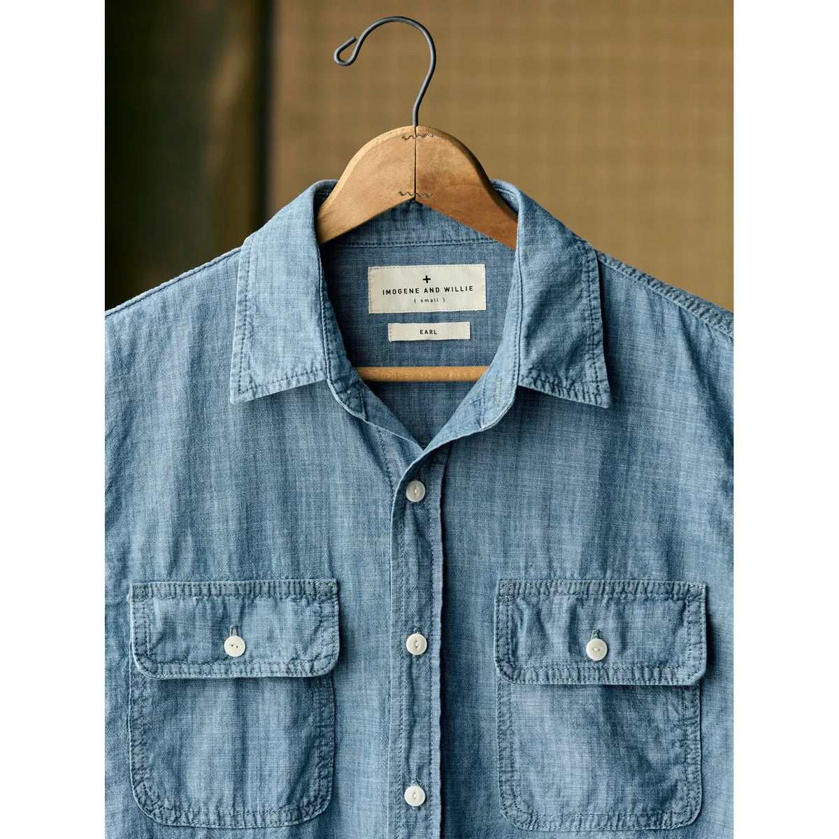 Men's Earl Chambray 2-Pocket Workshirt in chambray blue by imogene + willie, featuring a casual fit and two front pockets.