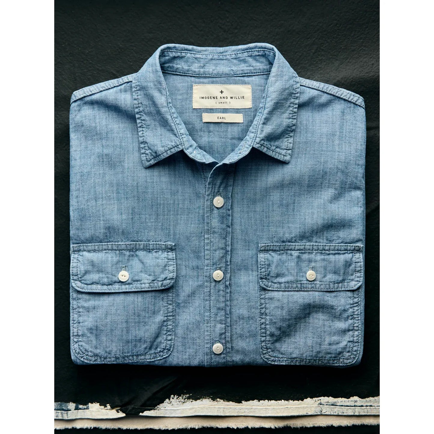 Men's Earl Chambray 2-Pocket Workshirt in chambray blue by imogene + willie, featuring a classic button-up design and two chest pockets.