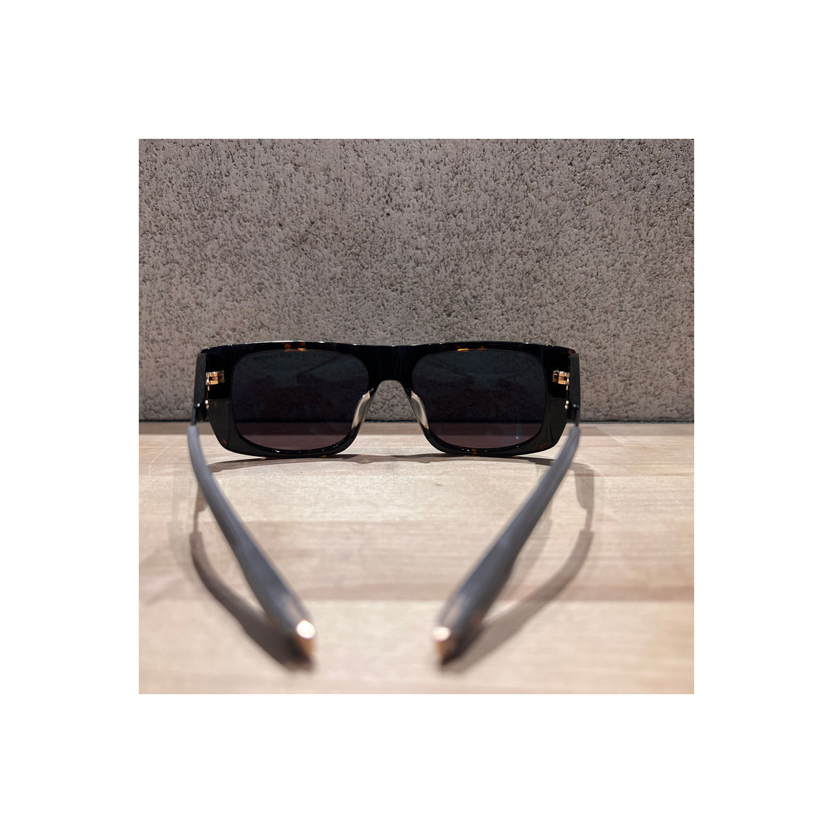 DITA LSA 703 tortoise and gunmetal accessories with G12 detail, showcasing stylish design and craftsmanship.