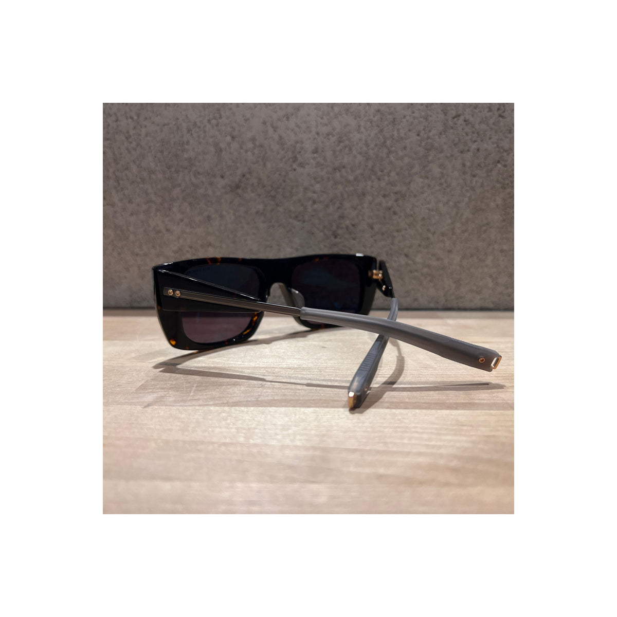 Tortoise and gunmetal DITA LSA 703 accessories with G12 detail, featuring sleek, stylish design and high-quality craftsmanship.