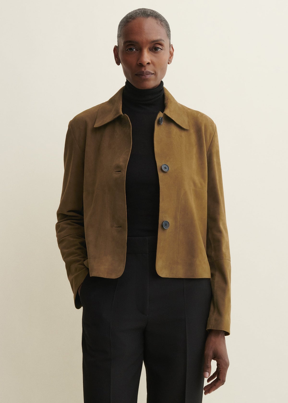Women's Emy Suede Jacket in dark olive by ARMA, showcasing the stylish, soft suede material and fitted design.