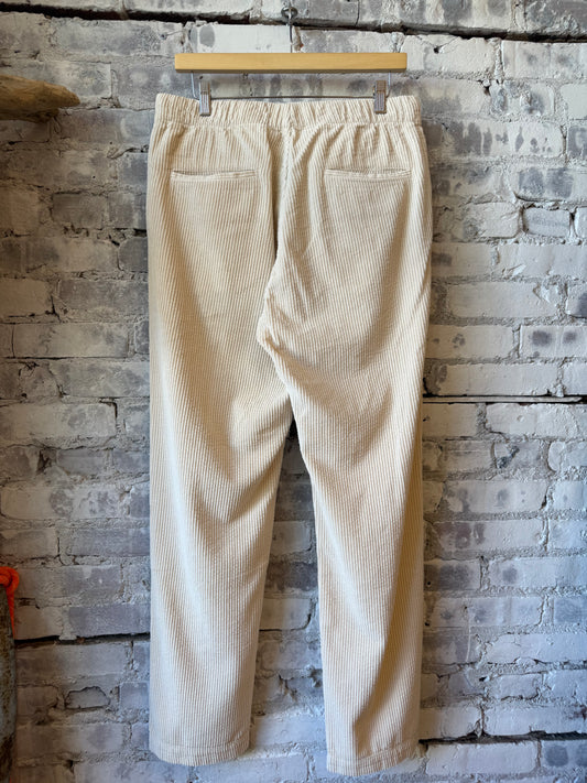 Hartford Men's Joggy Cord Woven Pants in eggshell color, showing comfortable fit and textured cord fabric.