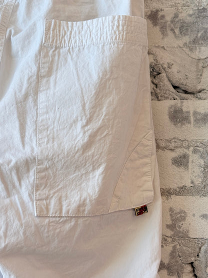 Women's white Homestud Outofsight Poplinair Flapsnap Kite Pants by Freecity, featuring a relaxed fit and stylish design.