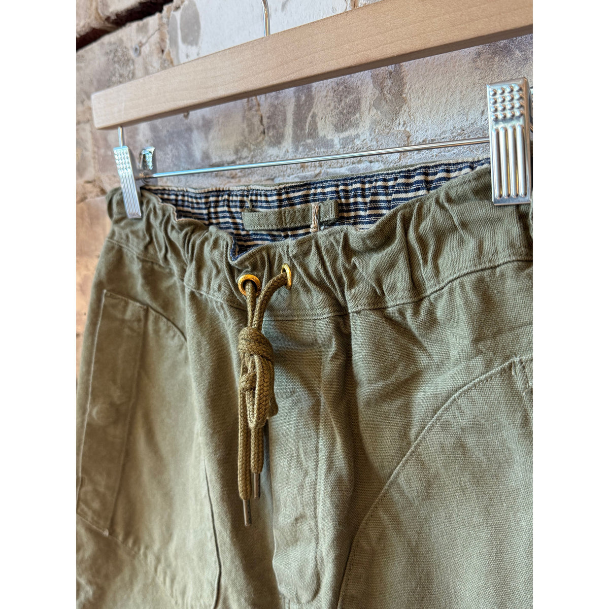 Men's olive premium deck shorts by Freenote Cloth, featuring a relaxed fit and casual style perfect for summer wear.
