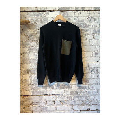 Men's Cashmere Pocket Crew sweater in black and olive, featuring a soft cashmere fabric and front pocket detail.