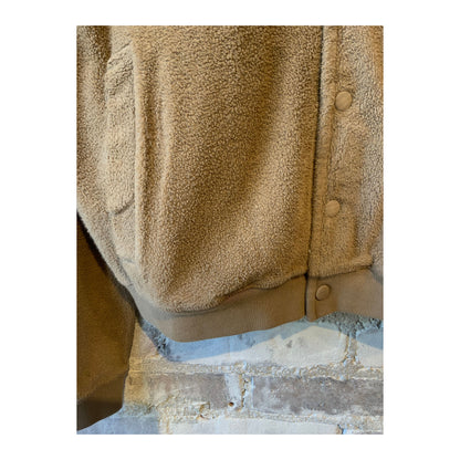 Men's PF Bomber Jacket in taupe with ribbed cuffs and collar, front zip closure, and stylish fit.