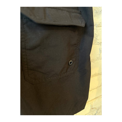 Men's black swim shorts with adjustable waistband and side pockets, made by 04651/.