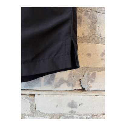 Men's black swim shorts with adjustable waistband and side pockets, made by brand 04651/.