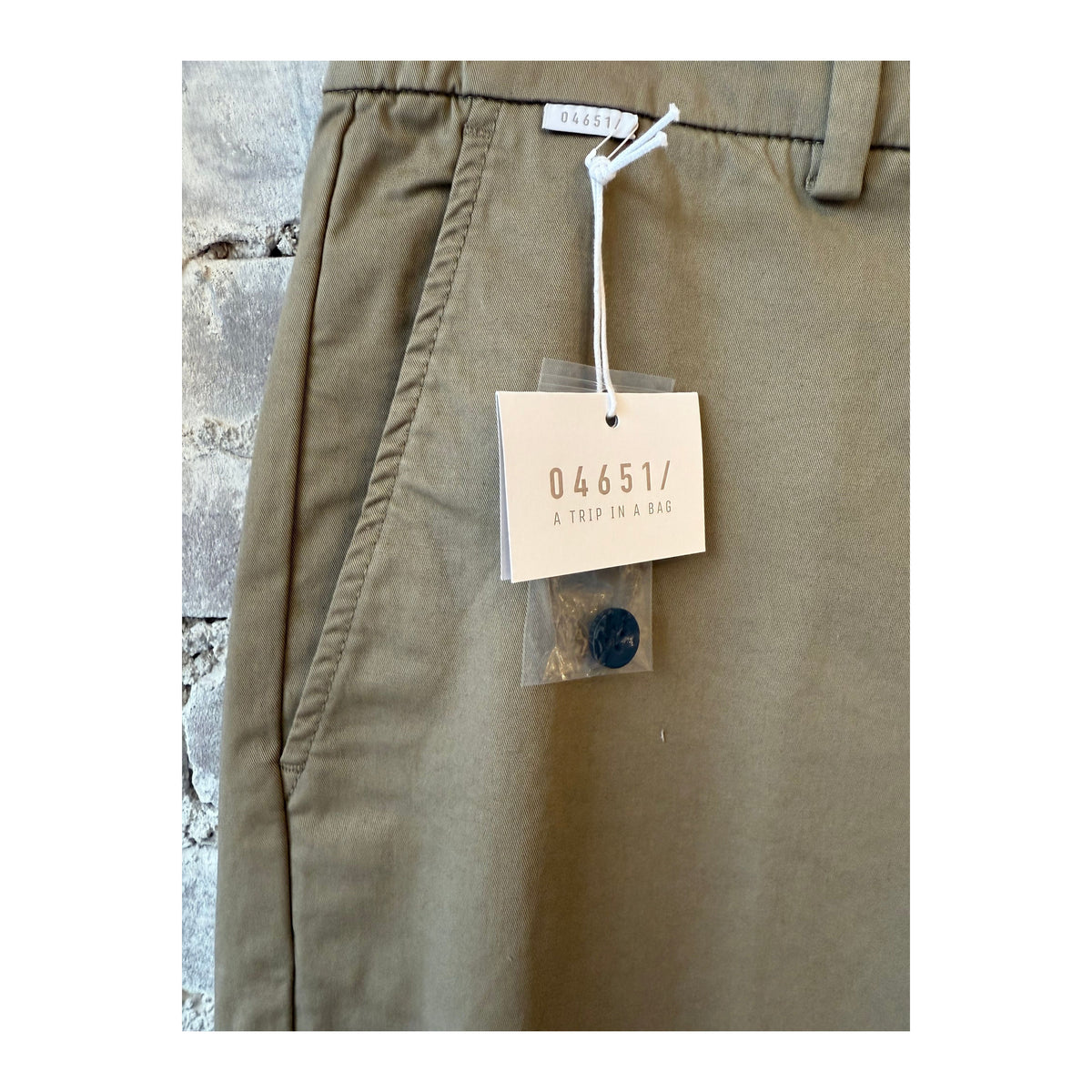 Men's taupe twill pants with a straight fit, featuring front pockets and belt loops, casual and versatile for everyday wear.