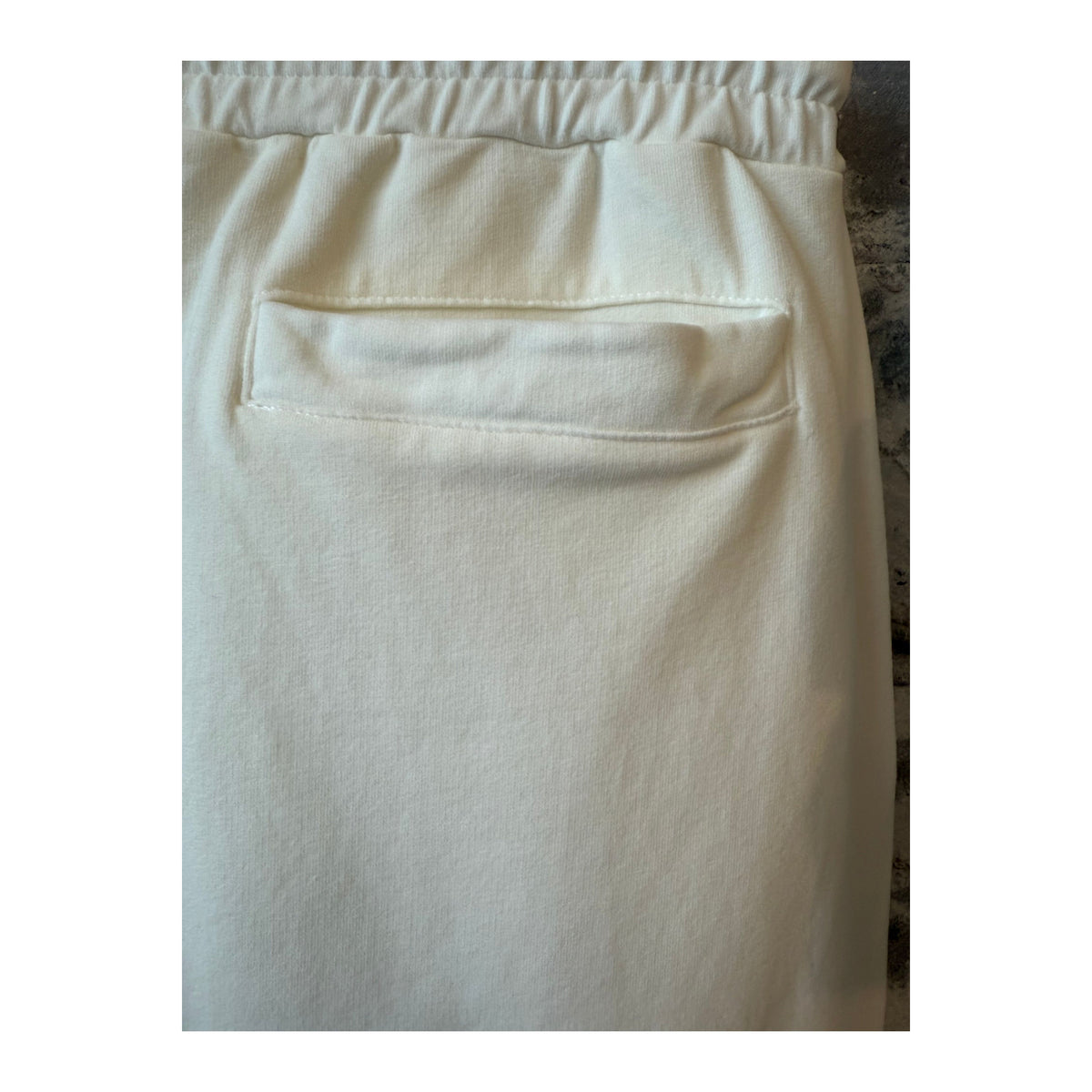 Men's ivory IF Joggers by 04651/ featuring comfortable fit and casual style, shown in front view with soft fabric detail.