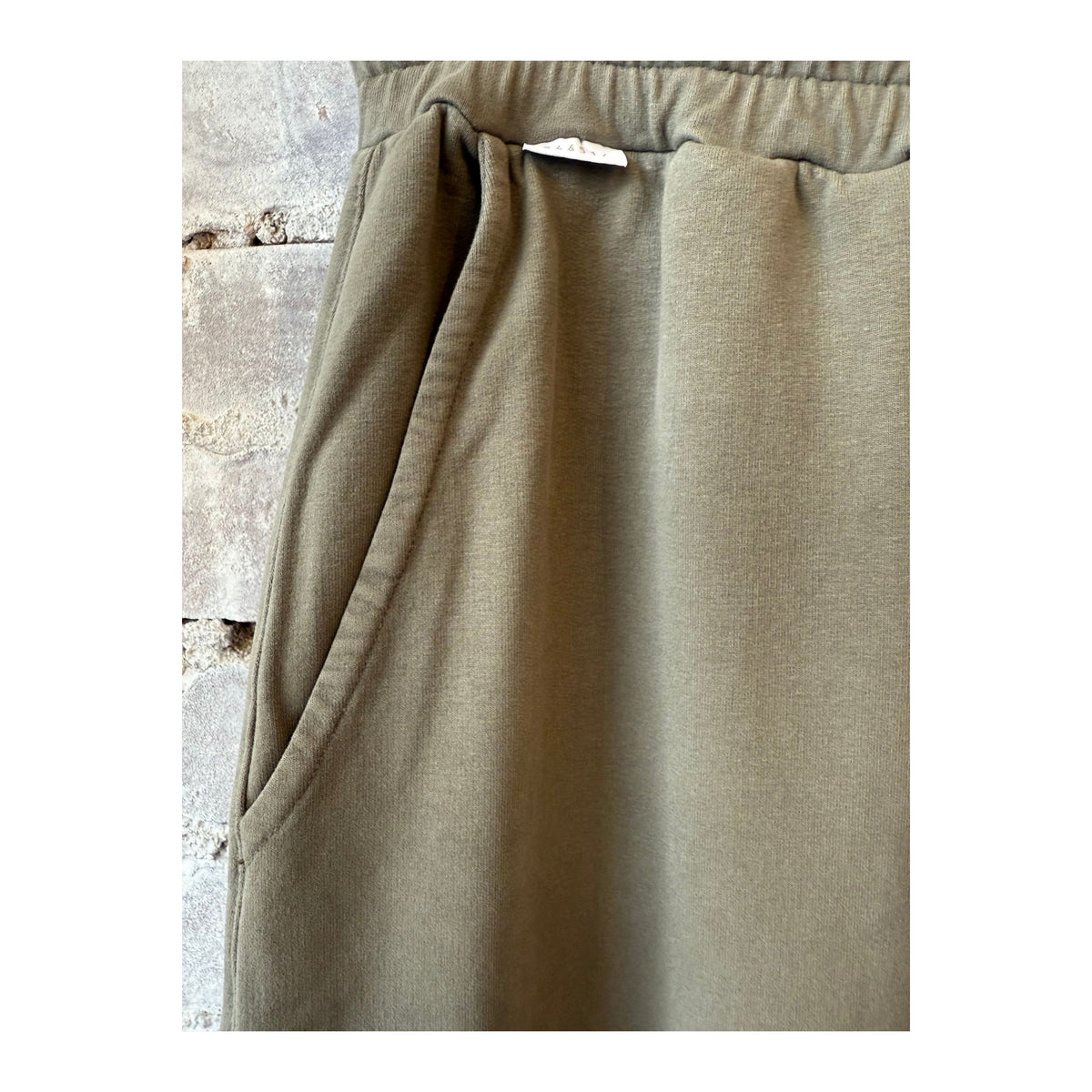 Men's IF Jogger in jungle green fabric, featuring a relaxed fit, elastic waistband, and cuffed ankles for casual style.