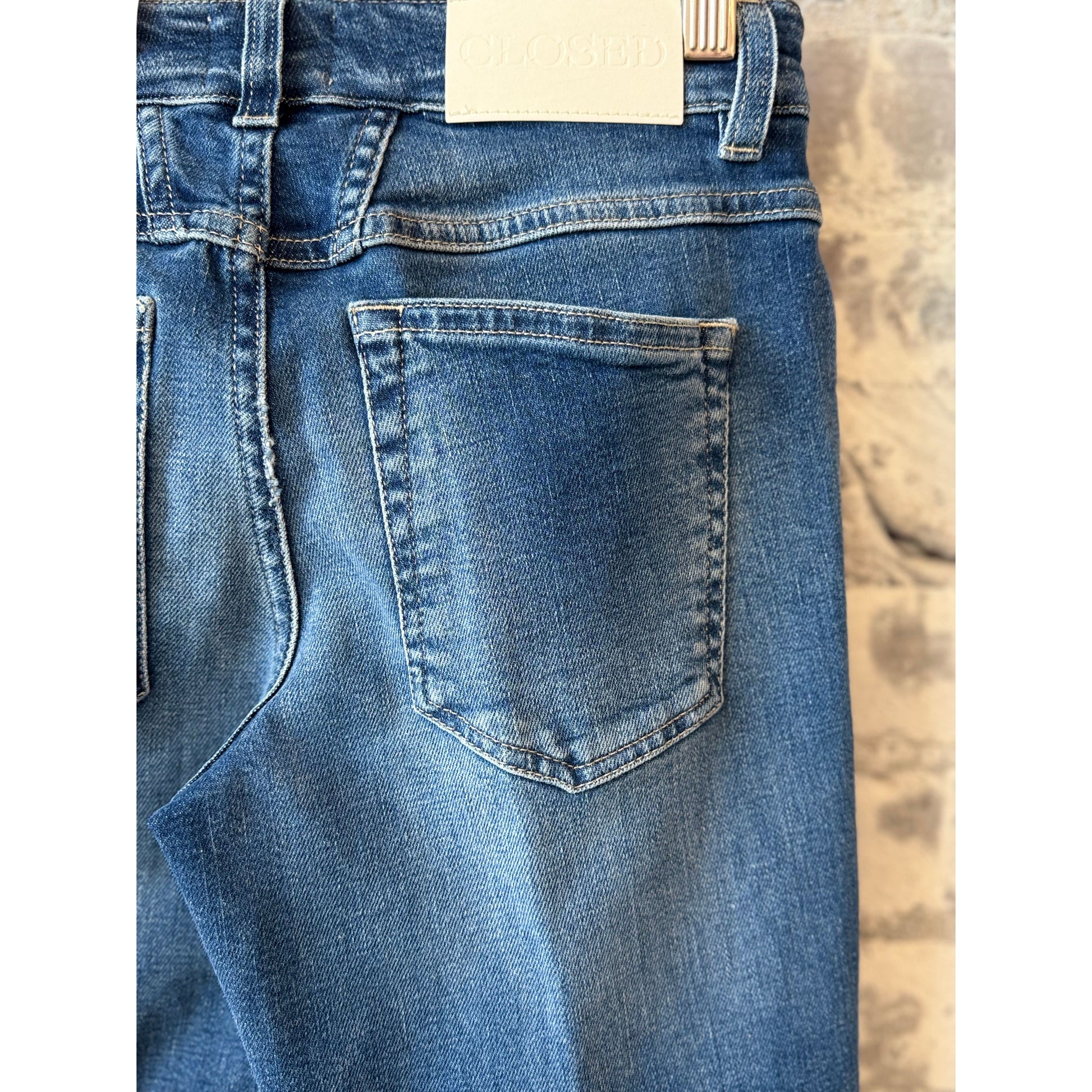 Mid blue women's Junna straight jeans by Closed Women's, showing classic fit and denim texture.