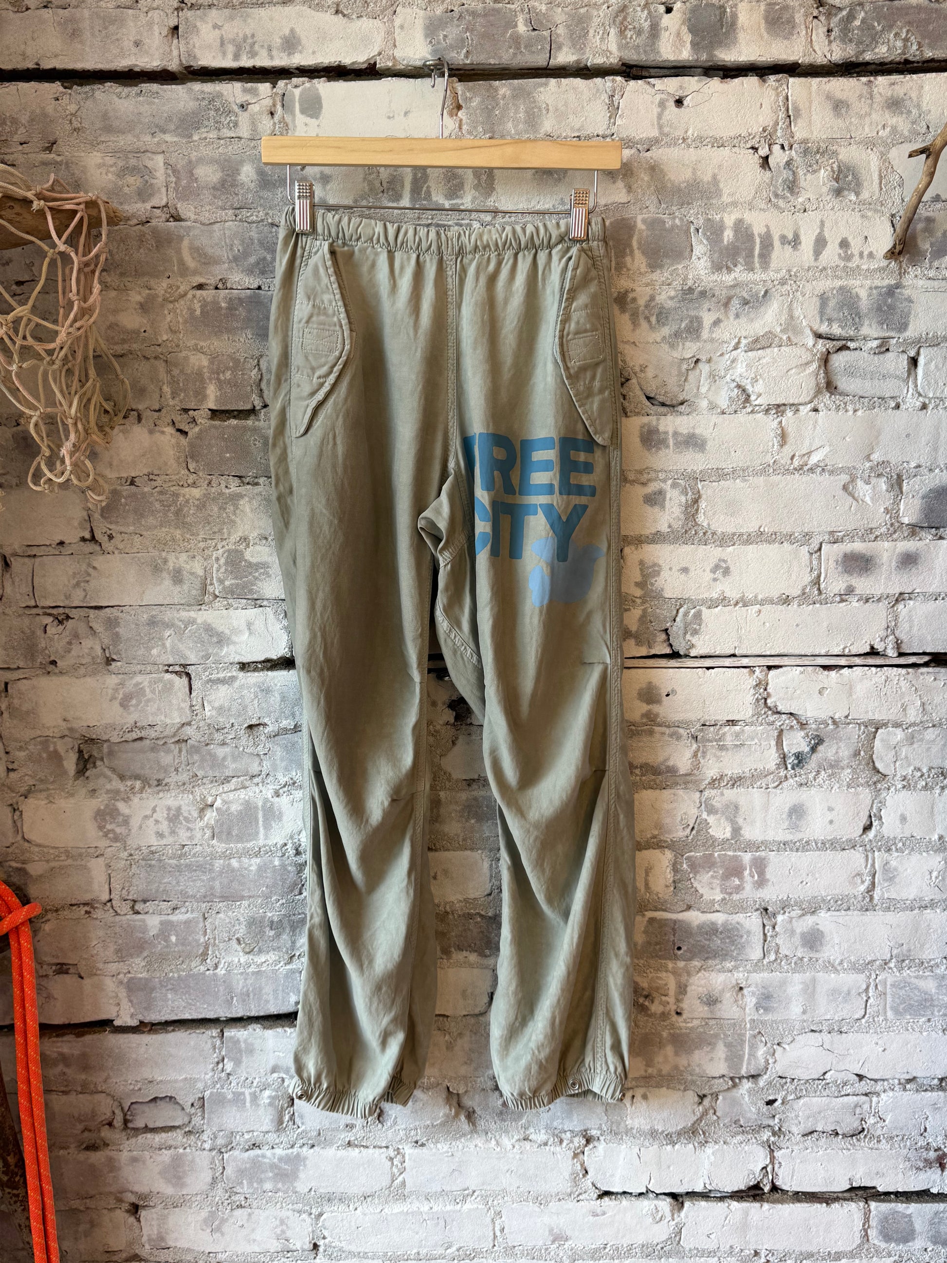 Women's Freecity Airjump Pants in silver rock blues with matte and satin finish, featuring flap and snap-free design.