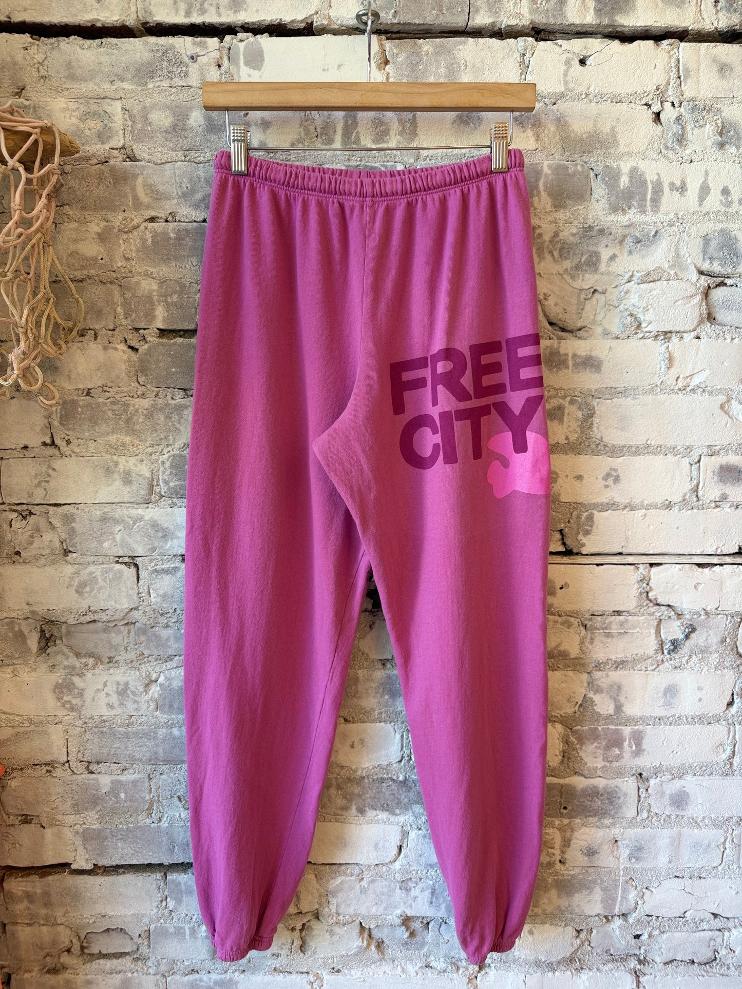 Freecity women's large pink sweatpants with pinkshroom pattern, relaxed fit and cozy fabric, displayed on a neutral background.